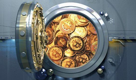 Графическое изображение сейфа, заполненного монетами Bitcoin