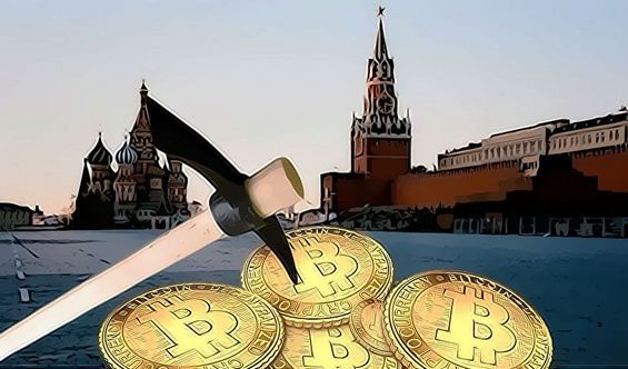 Шахтёрская кирка и монеты Биткоина на Красной площади