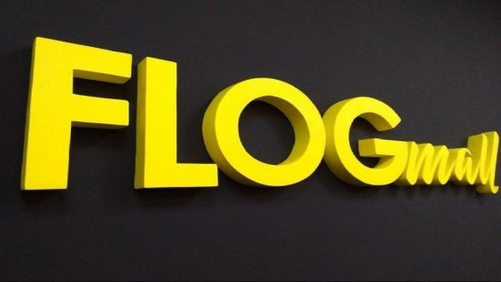 Логотип FLOGmall на тёмном фоне