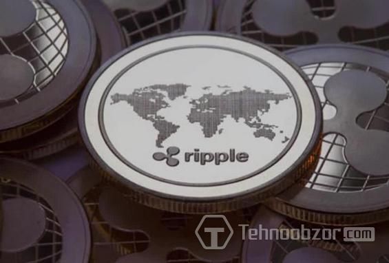 Монета Ripple с обозначением карты мира