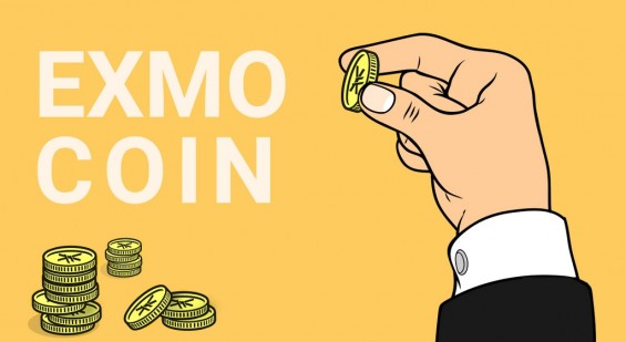 Монета Exmo Coin в руке