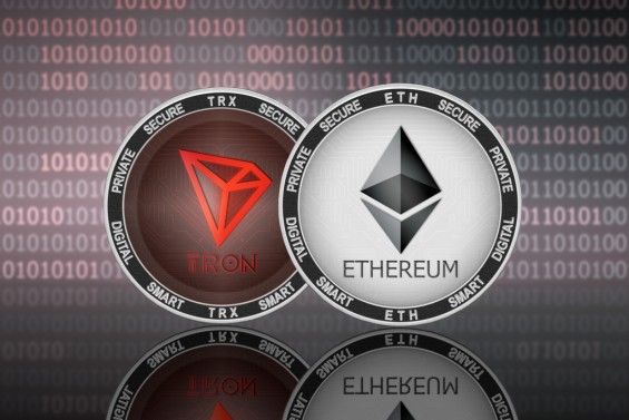 Монеты криптовалют TRON и Ethereum