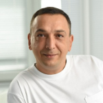 Олег Адамский